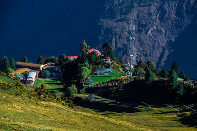 High angle view of trees and buildings against sky