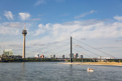 Rhine tower in the harbor called medienhafen at the river rhine in düsseldorf, germany