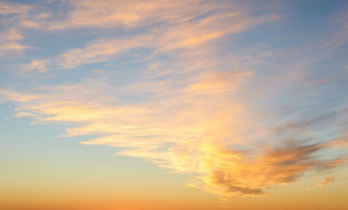 Low angle view of dramatic sky during sunset