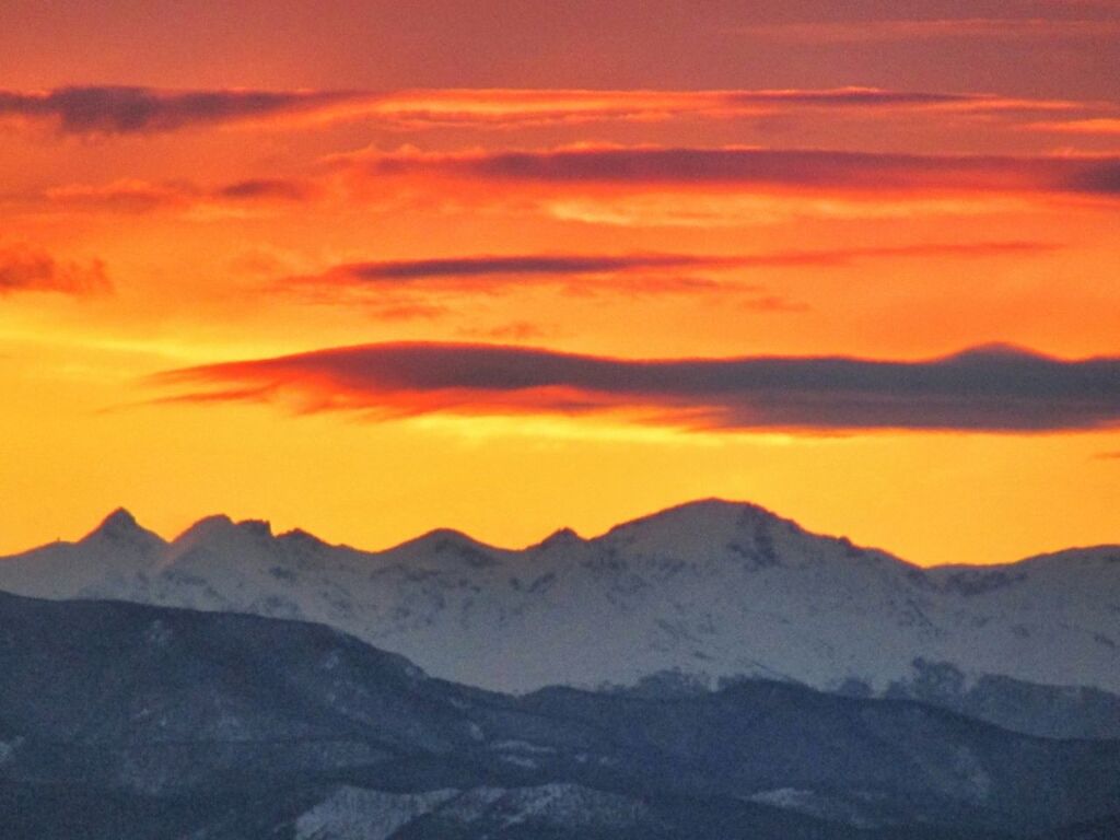 SCENIC VIEW OF MOUNTAINS DURING SUNSET