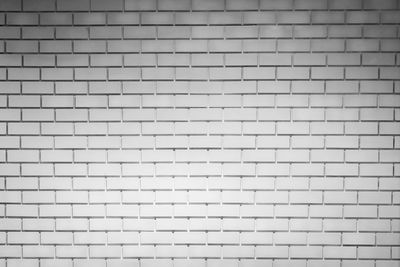 White brick wall texture background with space for text. white brick wallpaper. home interior.