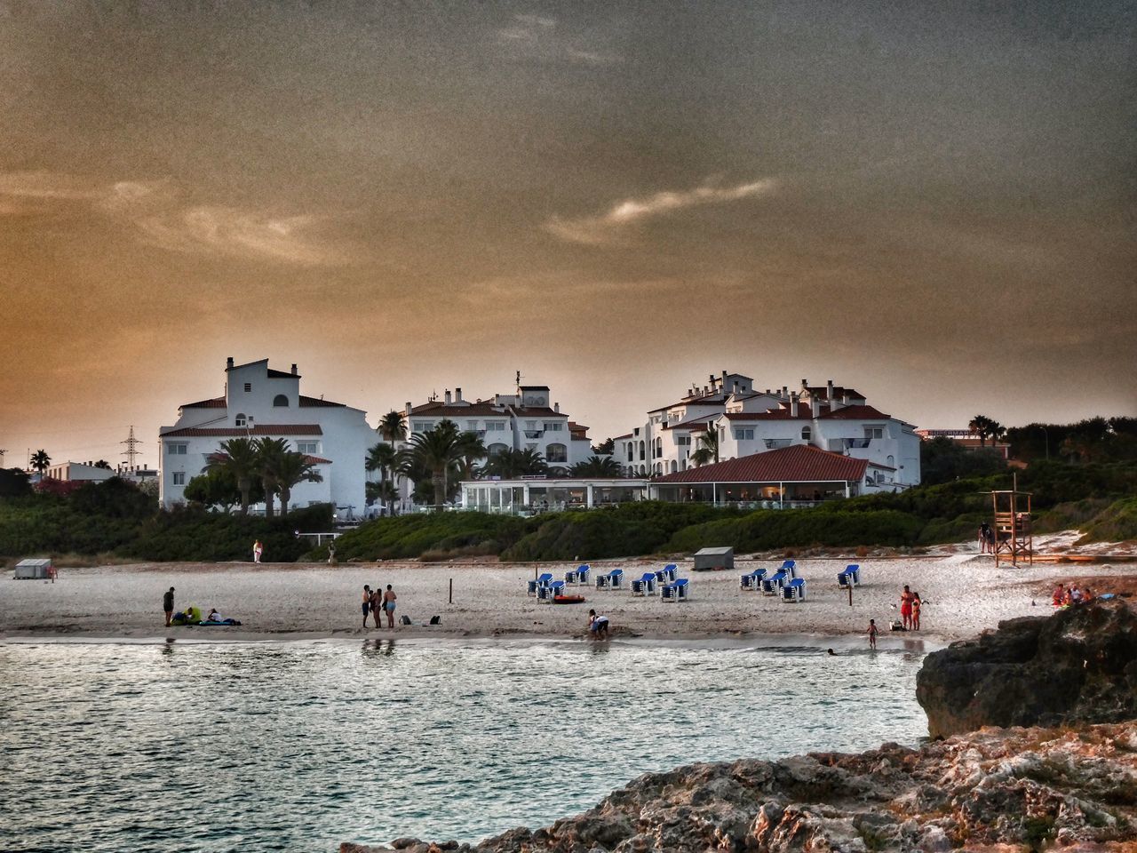 GROUP OF PEOPLE ON BEACH