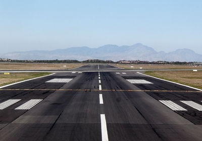 View of airport runway against sky