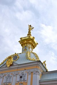 Low angle view of temple against building