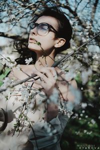Portrait of young woman looking away