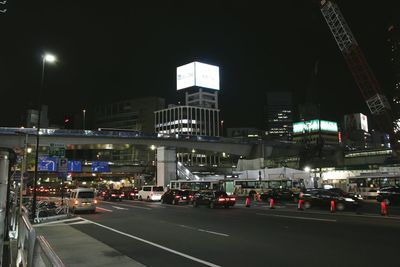 Illuminated cars at night