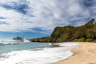 Scenic view of beach against sky