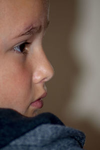 Close-up of boy looking away