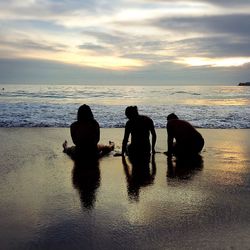 Scenic view of sea against sky at sunset