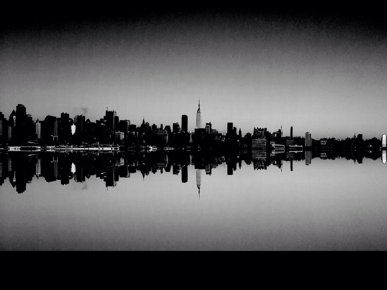 reflection, water, architecture, building exterior, copy space, built structure, clear sky, waterfront, river, standing water, silhouette, lake, city, sky, cityscape, no people, dusk, outdoors, mid distance, in a row