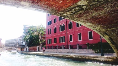 View of canal in city