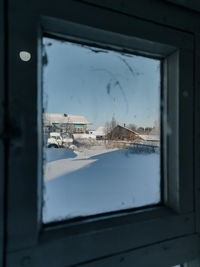 Buildings seen through window