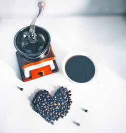 High angle view of black coffee on table