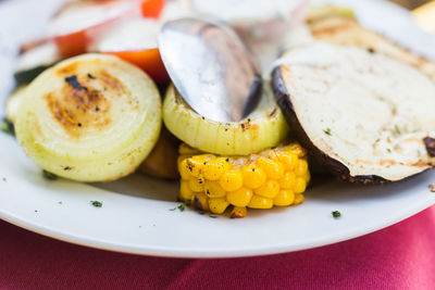 Close-up of fruits in plate on table