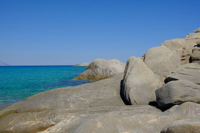 Scenic view of sea against clear blue sky