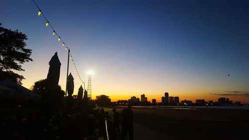 Silhouette of tree against sky at sunset