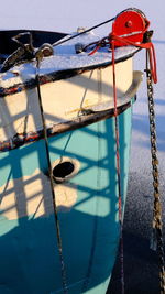 Close-up of boat moored in sea