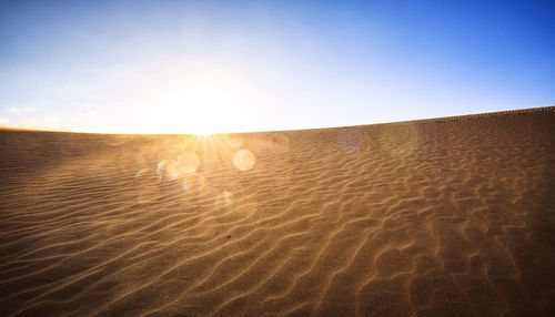 Scenic view of desert against sky