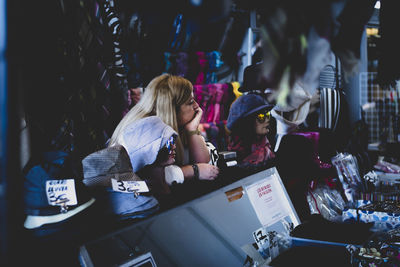 Women sitting in store