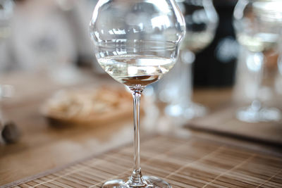 Close-up of wineglass on table