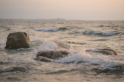 Scenic view of sea against sky during sunset