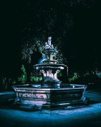 Statue of fountain at night