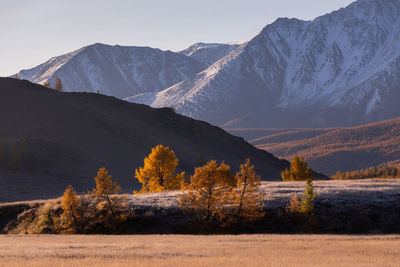 Scenic view of snowcapped mountains against sky