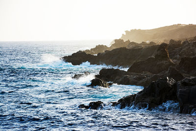 Scenic view of sea against clear sky