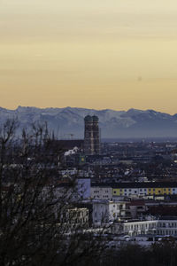 High angle view of buildings against sky at sunset