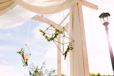 Low angle view of decoration against sky