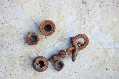 Close-up of rusty metals on floor