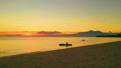 Scenic view of sunset over sea