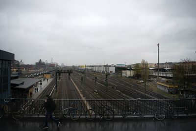 View of city against cloudy sky