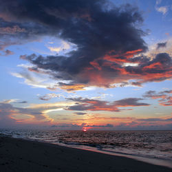 View of dramatic sky over sea during sunset