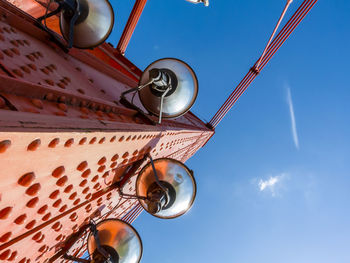 Low angle view of street light against sky