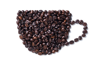 Close-up of coffee beans on white background
