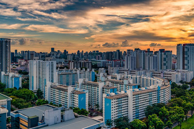 High angle view of buildings against sky during sunset