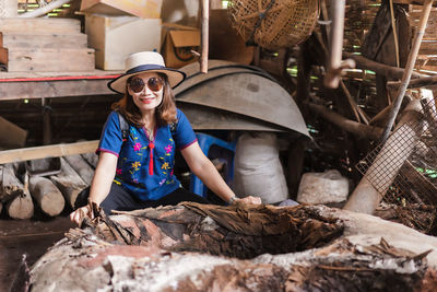 Portrait of smiling woman wearing sunglasses