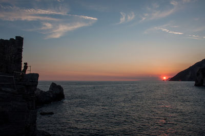 Scenic view of sea at sunset