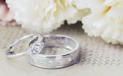 High angle view of wedding rings on table