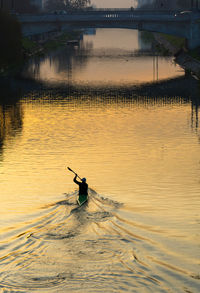 High angle view of man on boat in water