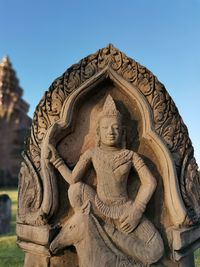 Angel sculpture on sandstone