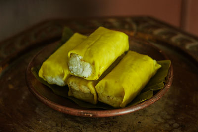 High angle view of fruits in plate on table