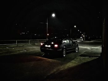 Car on street at night