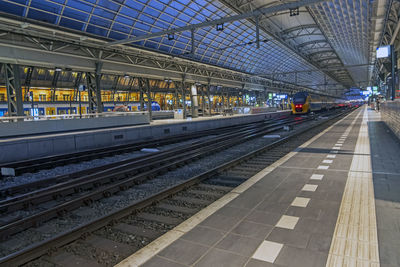 Empty central station during the corona crisis in amsterdam the netherlands at night