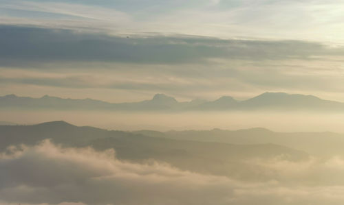 Scenic view of mountains against sky during sunset