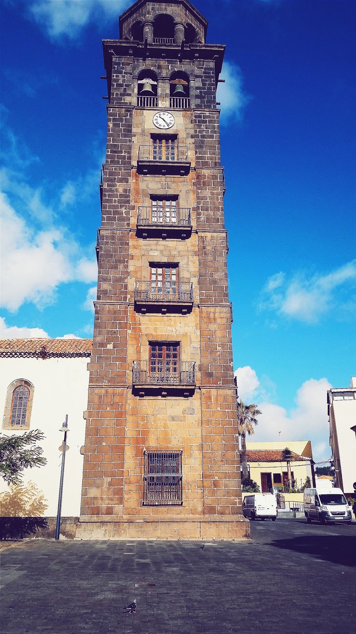 VIEW OF CLOCK TOWER AGAINST SKY