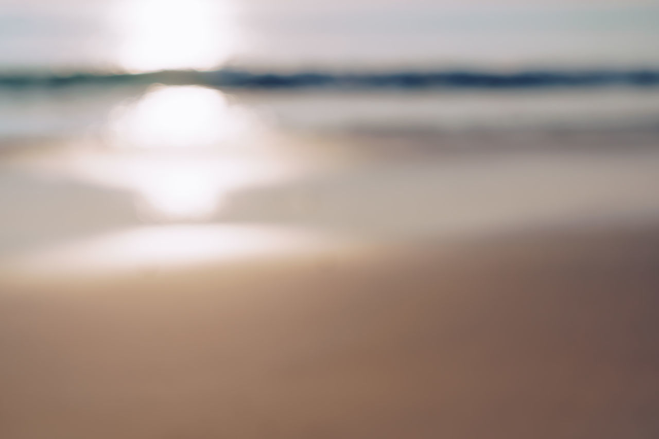 SCENIC VIEW OF SEA AGAINST SKY AT SUNSET