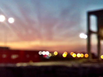 Defocused image of illuminated lights at night