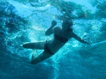 Man swimming in sea